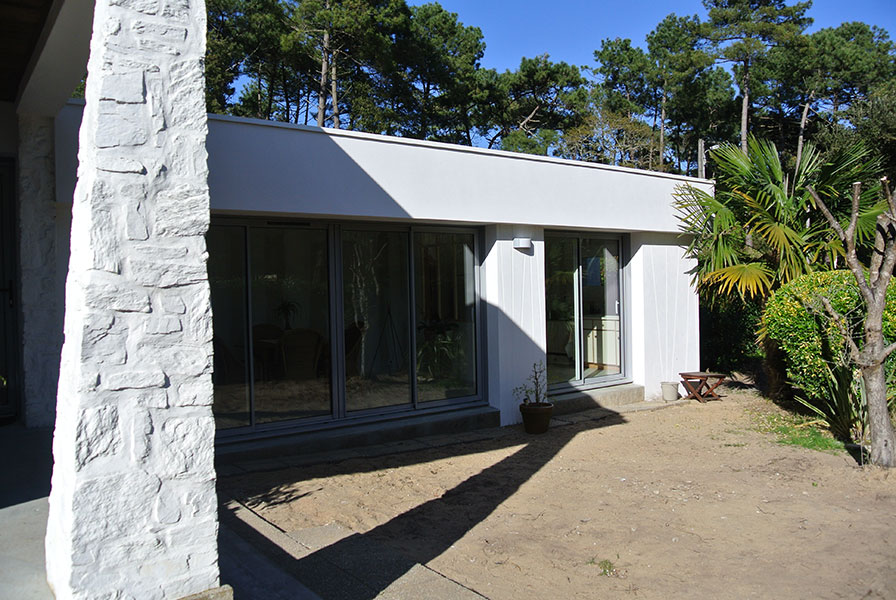 extension maison volume beton